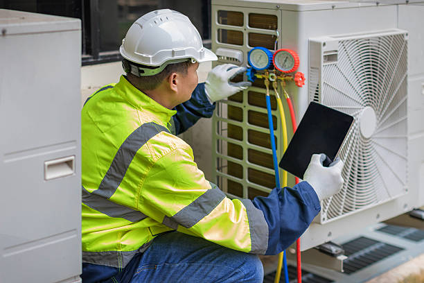 Professional Air Conditioning Repair technician working in Denmark, WI